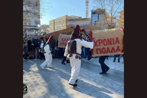 Volakas,Greece-January 7, 2022: In the village of Volakas, in Drama, every January (6-8) revives the custom of "Harapia", means "Black men", because of their black traditional costumes.