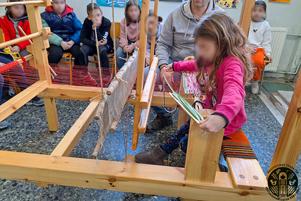 Volakas,Greece-January 7, 2022: In the village of Volakas, in Drama, every January (6-8) revives the custom of "Harapia", means "Black men", because of their black traditional costumes.